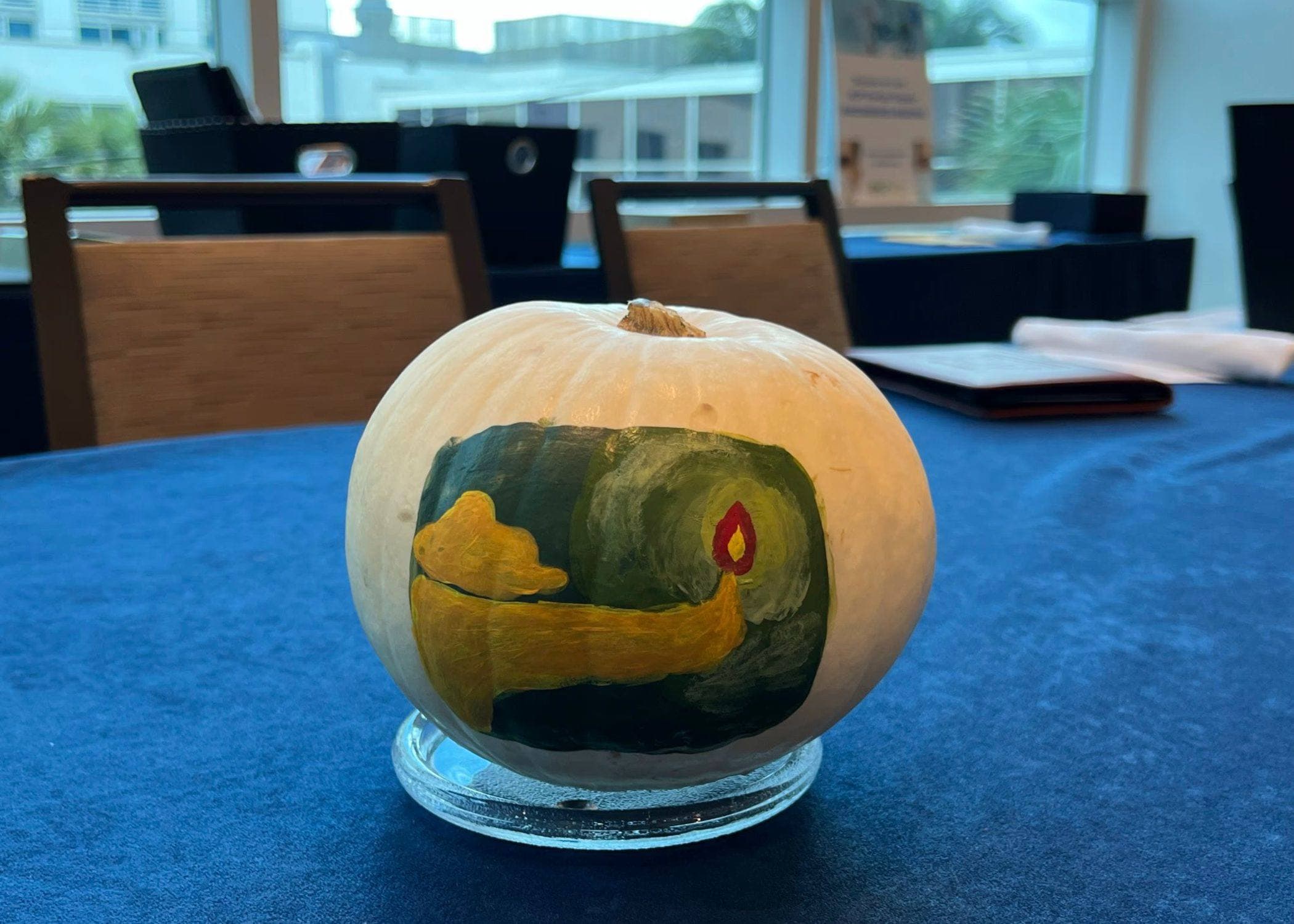 A pumpkin hand-painted by members at a chapter event