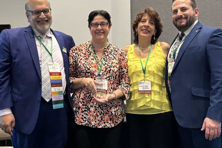 Members presenting an award at a chapter meeting